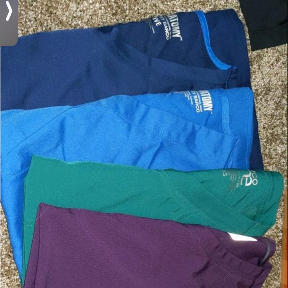 Scrubs BRAND NEW WITH NO TAG. XTRA SMALL TOPS AND SMALL BOTTOMS!